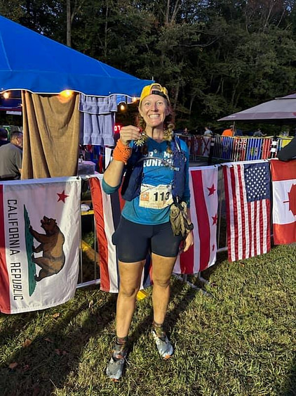 Heather after BFC 2024 with her Croix Heather with her Croix after finishing the Barkley Fall Classic 50k in 2024